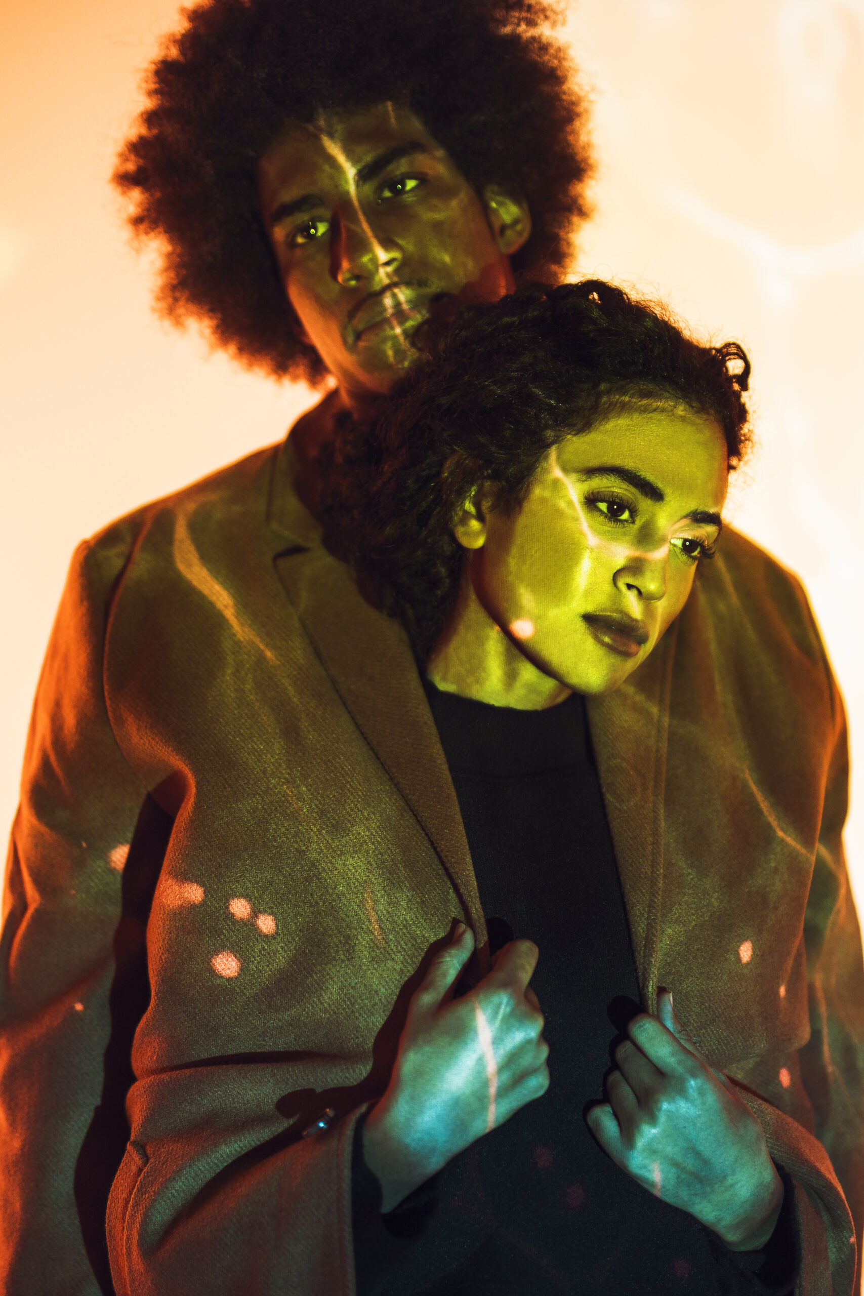 front-view-couple-with-water-effect-lights
