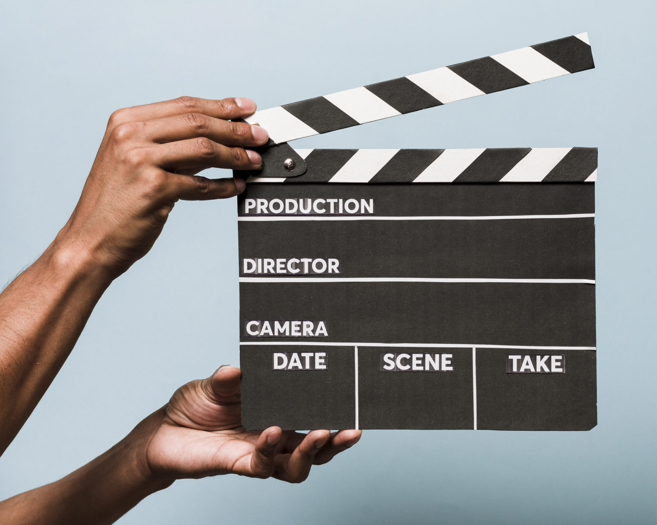 hands-with-movie-slate